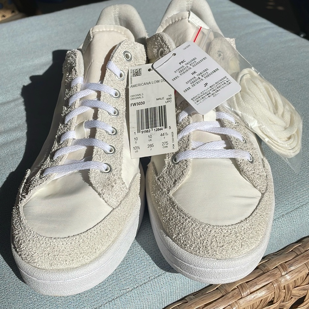 Adidas Americana low DG male size 10 1/2; not used. Athletic shoes/ snickers